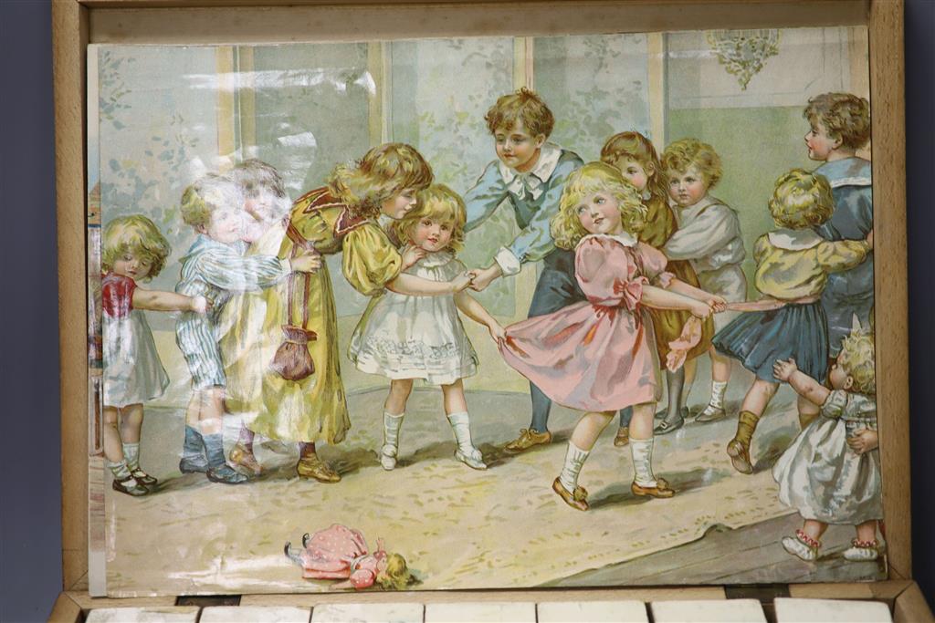 A Victorian chromo-lithographed building block set in original case.
